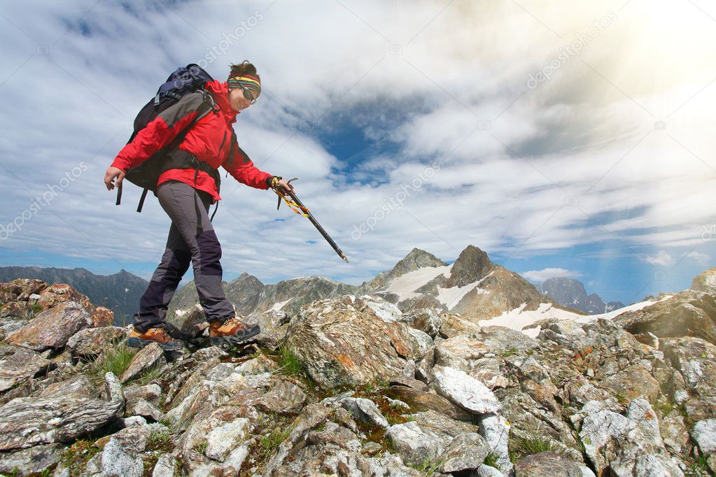 Hiker girl in Caucasus mountains
