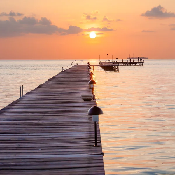 Wooden pier at the island in Indian ocean Stock Image