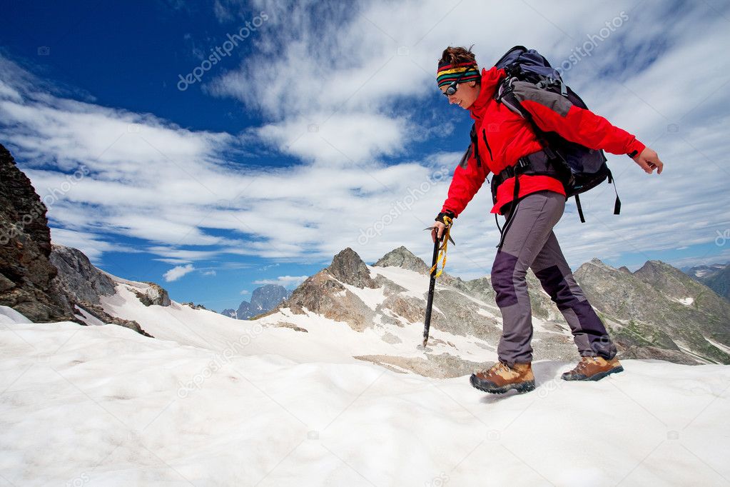 Hiker in Caucasus mountains