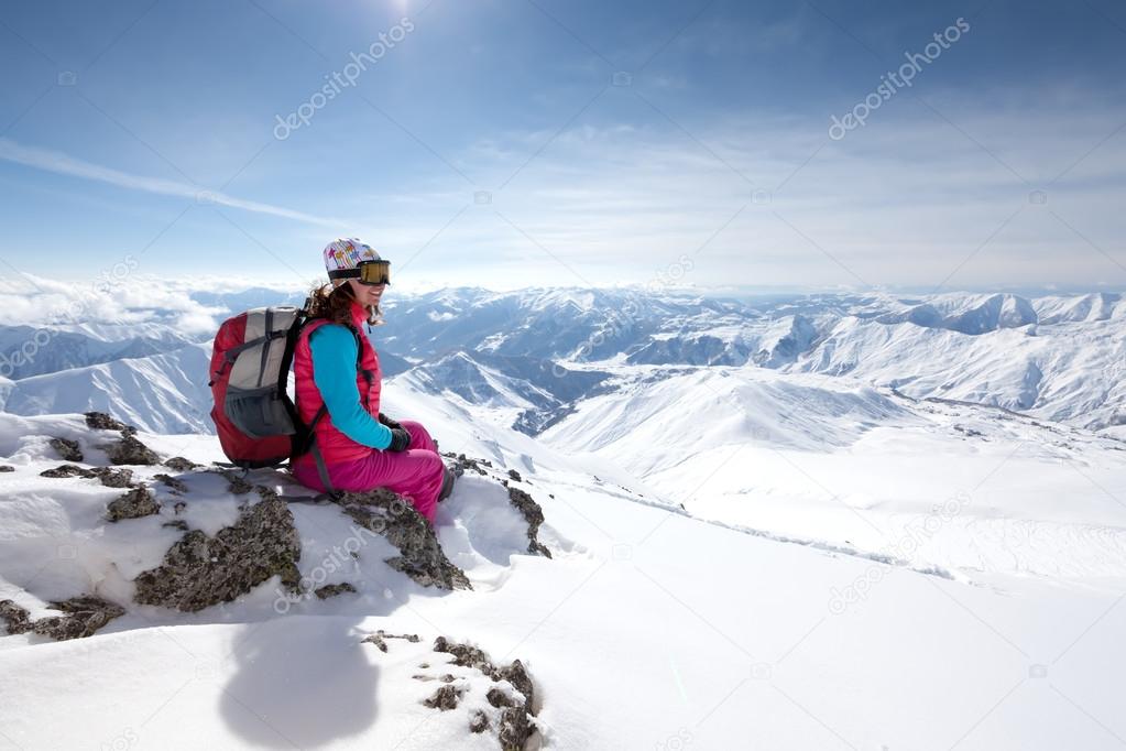 Hiker has fun in Caucasus winter mountains of Georgia