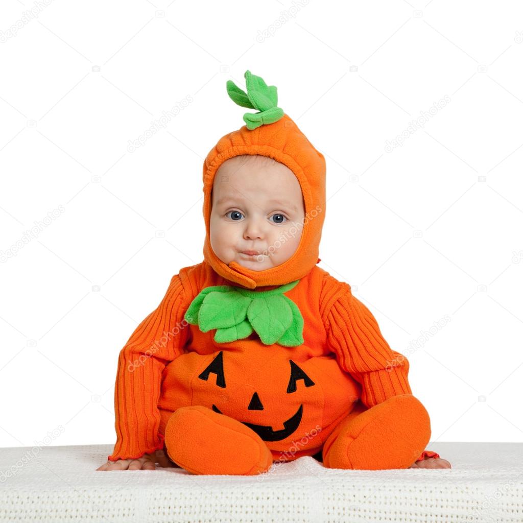 Child in pumpkin suit on white background