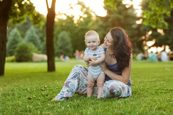 Caucasian baby boy take rest in summer park — Stock Photo, Image