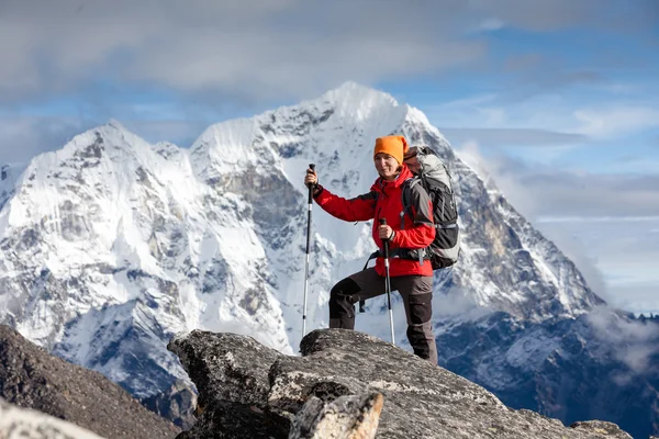 Hiker on the trek in Himalayas, Khumbu valley, Nepal Stock Photo