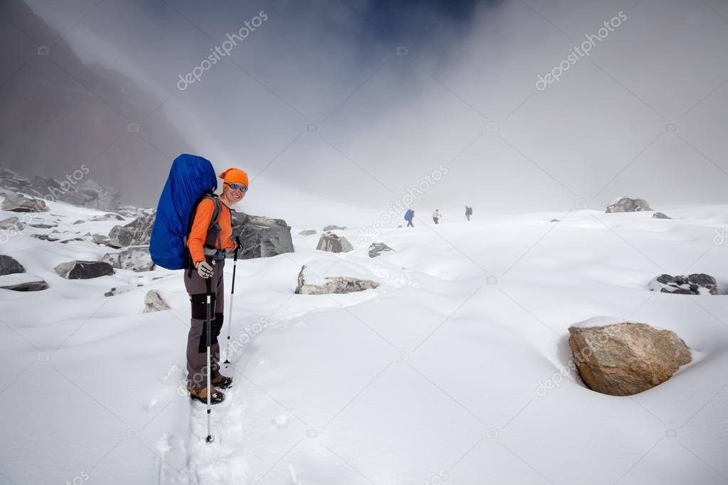 Hiker crosses Cho La pass in Khumbu valley, Nepal