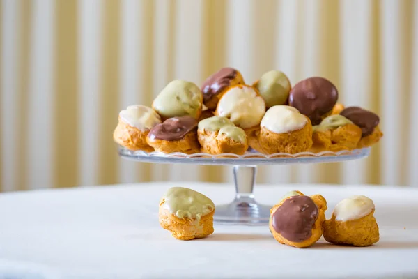 Profiterole, cream puff - French dessert choux pastry ball fille