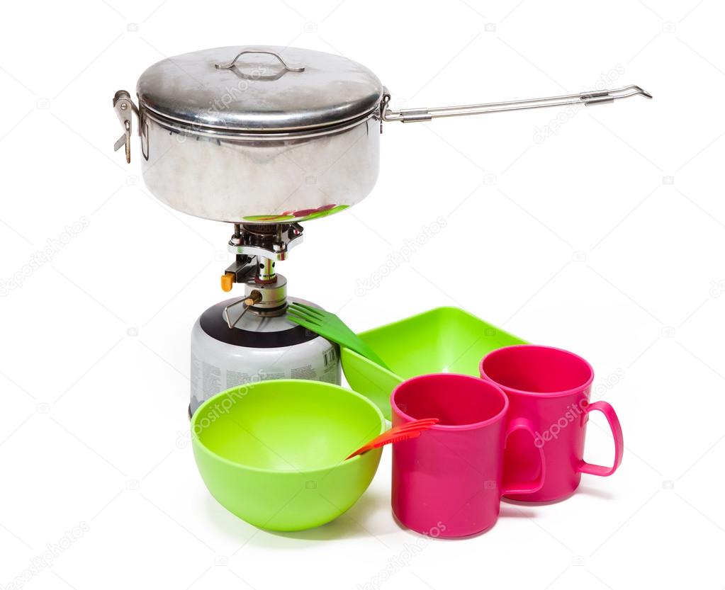 Cooking tourist equipment during camping on white background