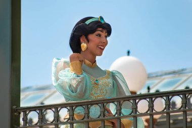 Orlando, Florida. August 04, 2020. Jazmine waving from the balcony at Walt Disney World Railroad at Magic Kingdom (2) clipart