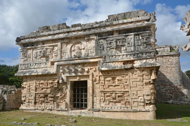 Church and temple of reliefs in Chichen Itza. clipart
