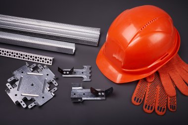 Construction helmet and fasteners