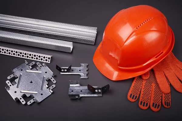 Construction helmet and fasteners — Stock Photo, Image