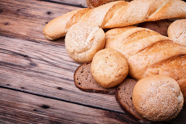 Golden bread on a wooden table