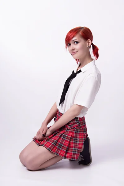 Anime girl in short skirt on a white background — Stock Photo, Image