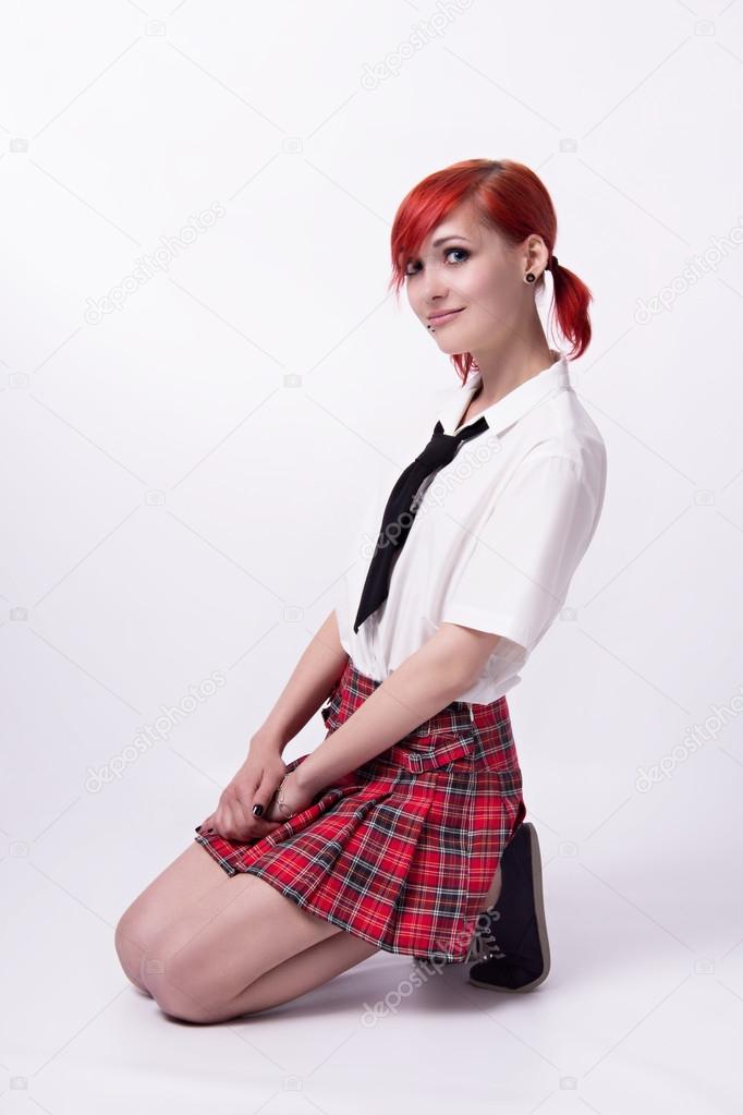 Anime girl in short skirt on a white background