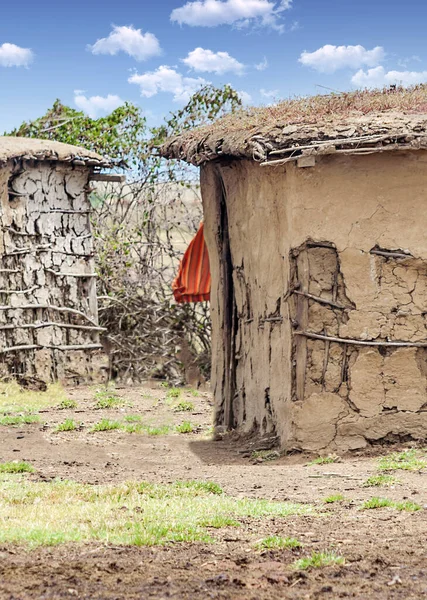 Poor village of Kenya in a sunny day. Its African landscape.