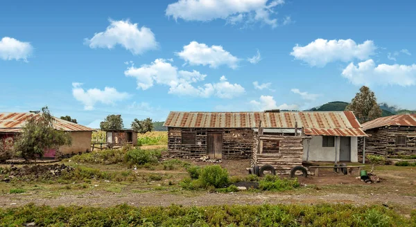 Poor village of Kenya in a sunny day. Its African landscape.