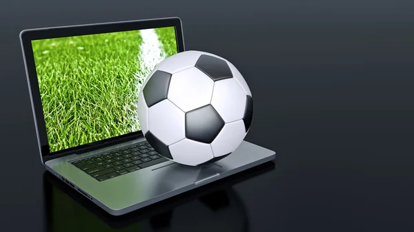 Laptop con pallone da calcio — Foto Stock