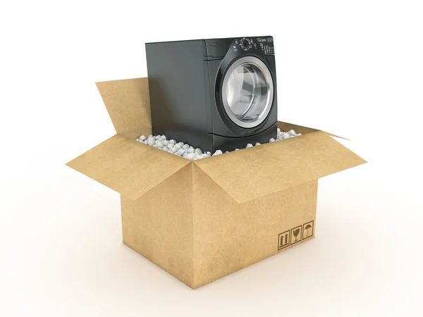 Washing machine in cardboard box — Stock Photo, Image