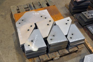 Metal kesimi. İşaretlenmiş parçaların depolanması.