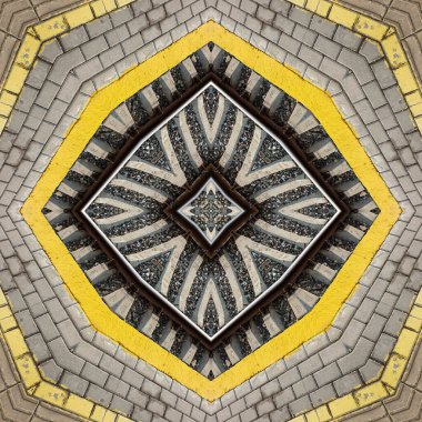 Bir kaleydoskopun demiryolu modelinin soyut arkaplanı. Gri tuğlalar ve sarı çizgi arka plan fraktal mandala. Soyut kaleydoskopik arabesk. Geometrik süs deseni