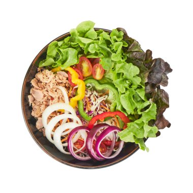 Top view of tuna salad with lettuce, bell peppers, onions, and cherry tomatoes isolated on white background with clipping path. Fresh, healthy, and colorful dish perfect for menu design, packaging, or clean food concept.