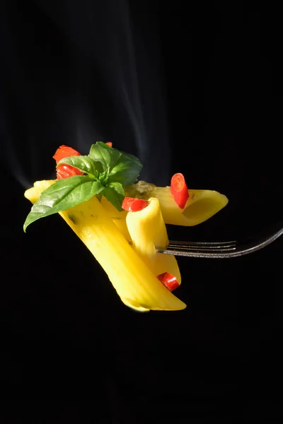 Pasta with basil and red pepper — Stock Photo, Image