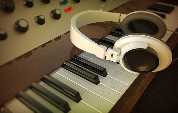 Headphones and electric piano — Stock Photo, Image