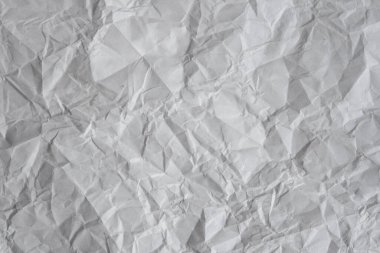 Gri arka plan. Buruşuk kağıt kaplama arka plan. Boş buruşmuş kağıt dokusu.