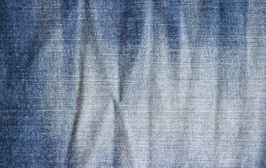 Klasik kot kumaş, kot pantolonun yüksek detaylı fotoğrafı...