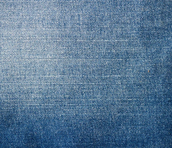 Alta foto dettagliata di tessuto jeans classico. Sfondo in denim, texture. — Foto Stock