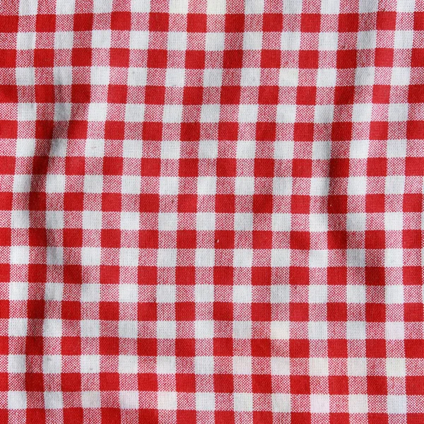 Textura de um cobertor de piquenique quadriculado vermelho e branco . — Fotografia de Stock