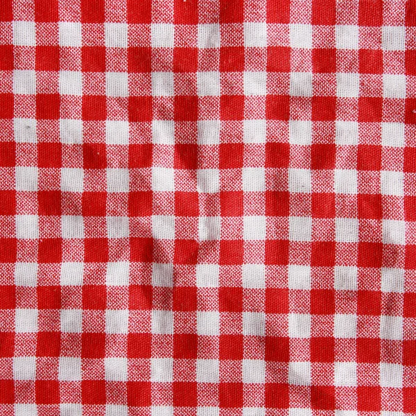 Texture d'une couverture de pique-nique à carreaux rouges et blancs . — Photo