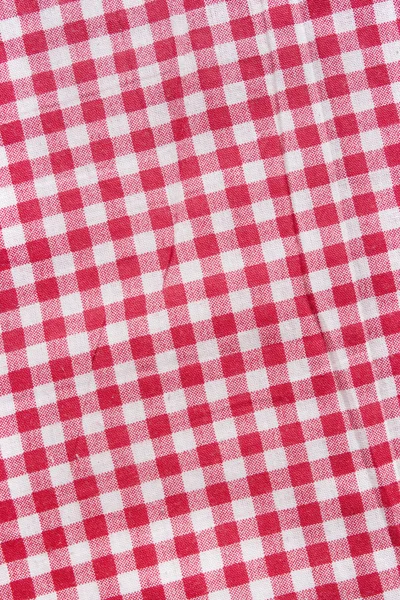 Texture di una coperta da picnic a quadretti rossi e bianchi . — Foto Stock