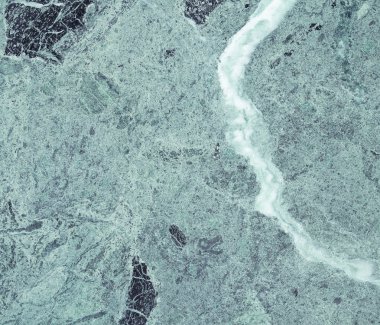 Koyu yeşil İtalyan granit doğal desenli.