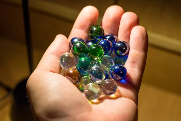 Multicolored Glass Balls Palm Closeup Fotografia De Stock