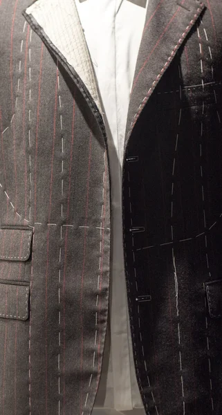 더미에 양복 재단사 — 스톡 사진
