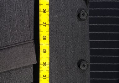 Takım elbise ve şerit metre