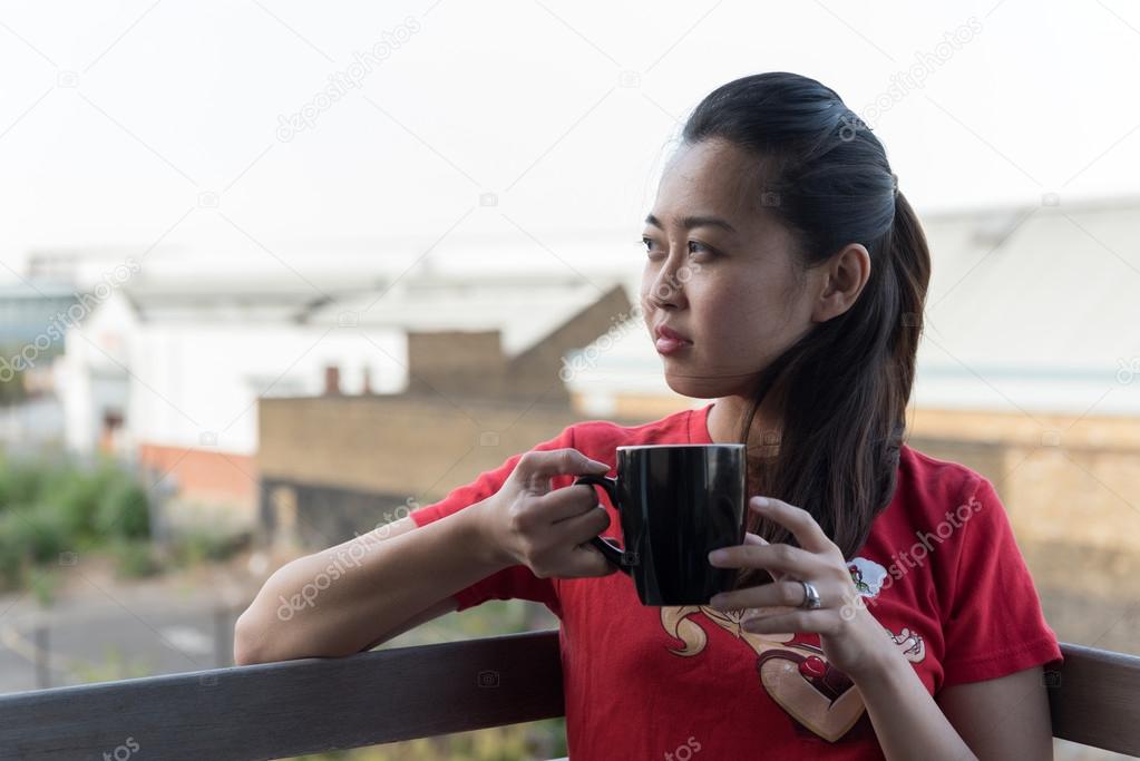 Asian Girl Drinking Coffee