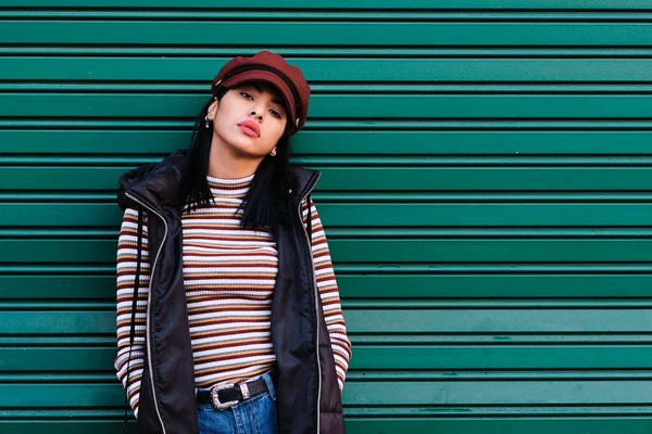 young moroccan girl with short hair with fall outfit - fall concept