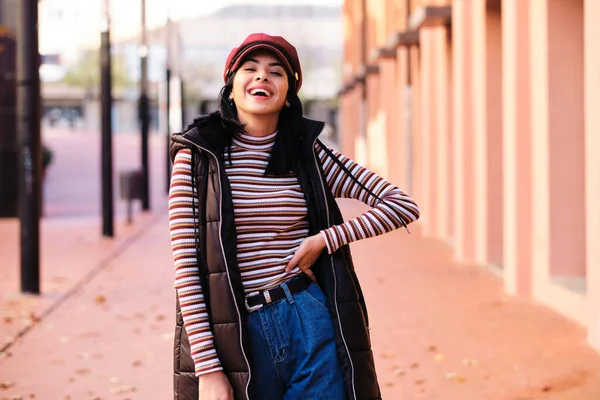 young moroccan girl with short hair with fall outfit - fall concept