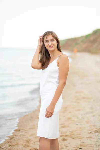 Girl White Dress Beach Sea Beautiful Sunset Smiling — Stockfoto