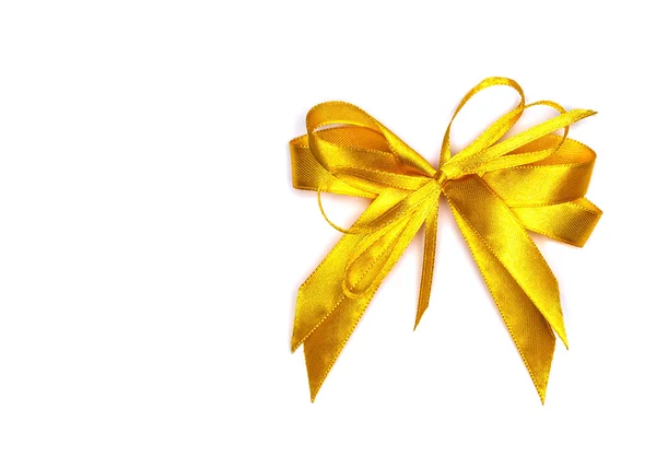 Golden satin gift bow. Ribbon. Isolated on white — Stock Photo, Image