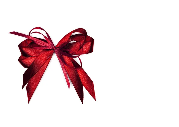 Red satin gift bow. Ribbon. Isolated on white — Stock Photo, Image