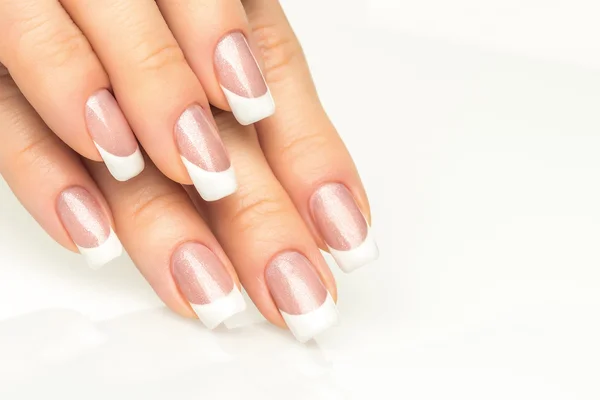 Woman hands with french manicure  close-up — Stock Photo, Image