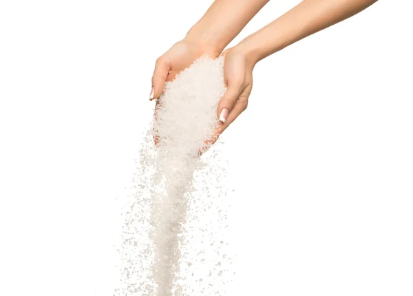 Sea salt crystals in women hand — Stock Photo, Image