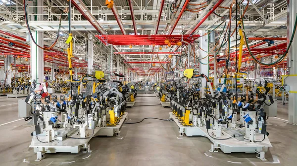 Automobile assembly line production.The car assembly line is not assembled to complete the car skeleton