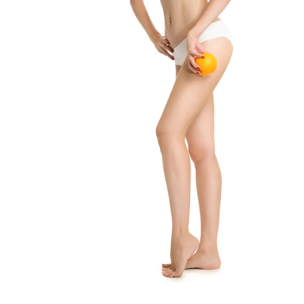 Sexy girl shows cellulite and orange — Stock Photo, Image