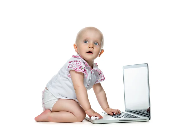Baby with laptop on the white background — Stock Photo, Image