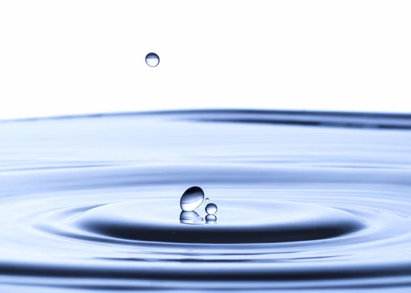 Blue water drop falling down, water splash — Stock Photo, Image