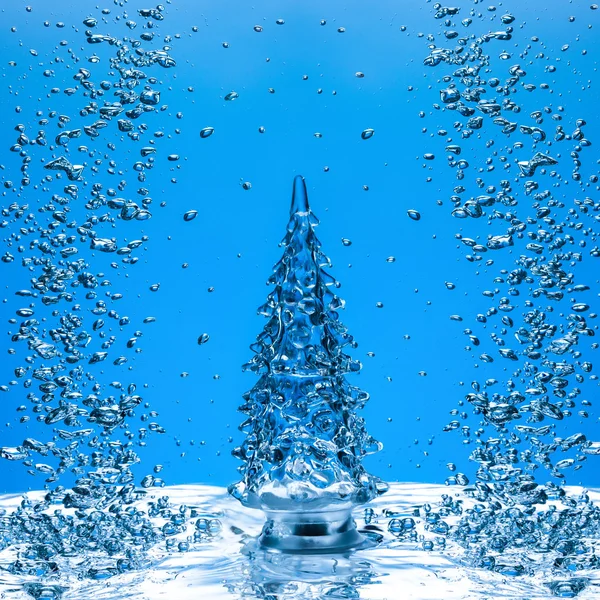 Árvore de Natal em fundo azul — Fotografia de Stock