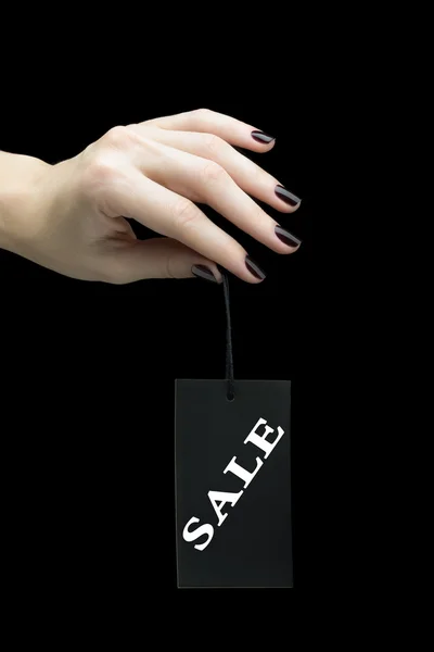 女性の手の販売タグ — ストック写真